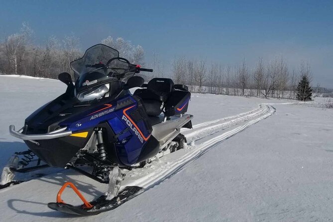 1.5-Hour Guided Snowmobiling Adventure - Arriving at Côte Lafleur