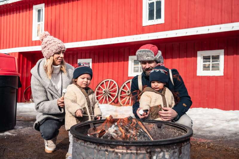 Banff: Family Friendly Horse-Drawn Sleigh Ride - Arriving at the red stables on Sundance Road