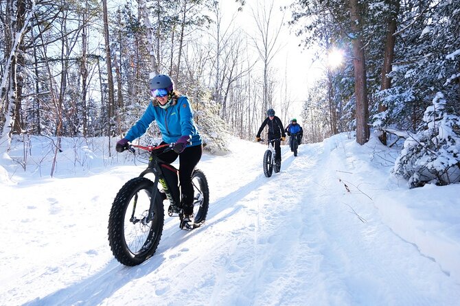Electric Fat Biking Adventure in Banff | Small Group Adventure - Banff Town Sign and the Fairmont hotel