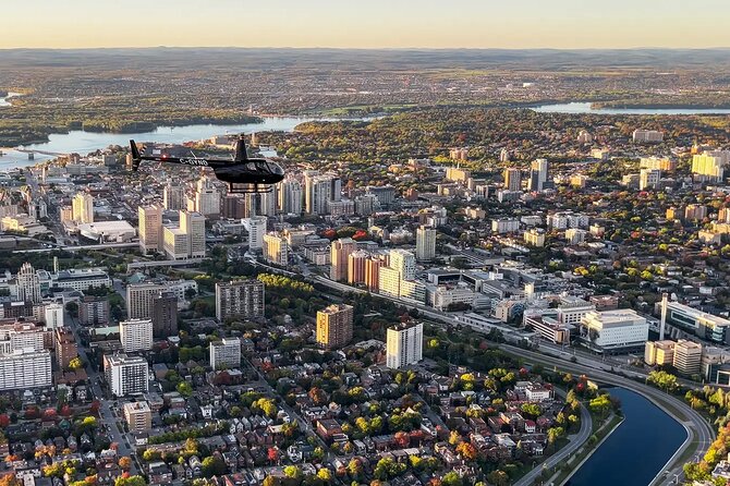 Fly over the City of Ottawa in a Helicopter - Château Laurier beside the Rideau Canal