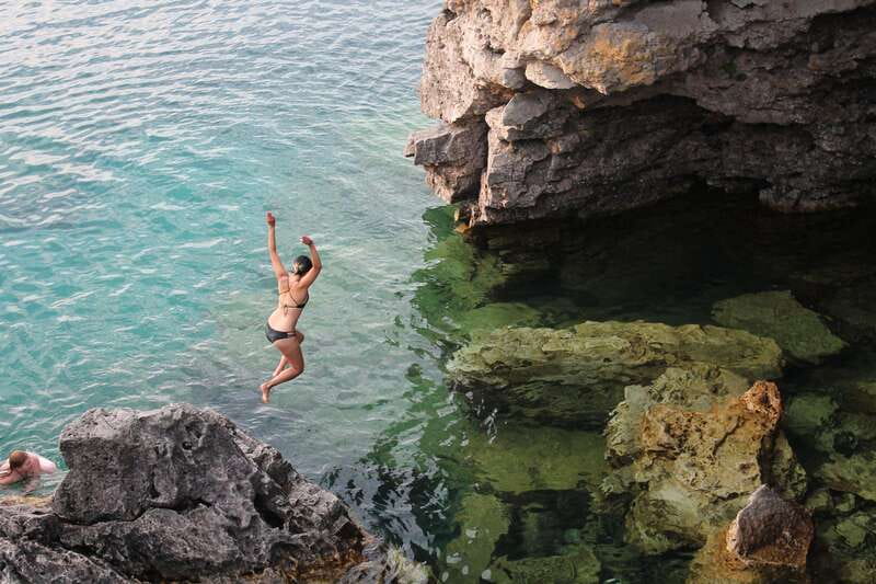 From Toronto: Bruce Peninsula National Park Guided Day Trip - The Grotto, from cliff edge to cave entrance