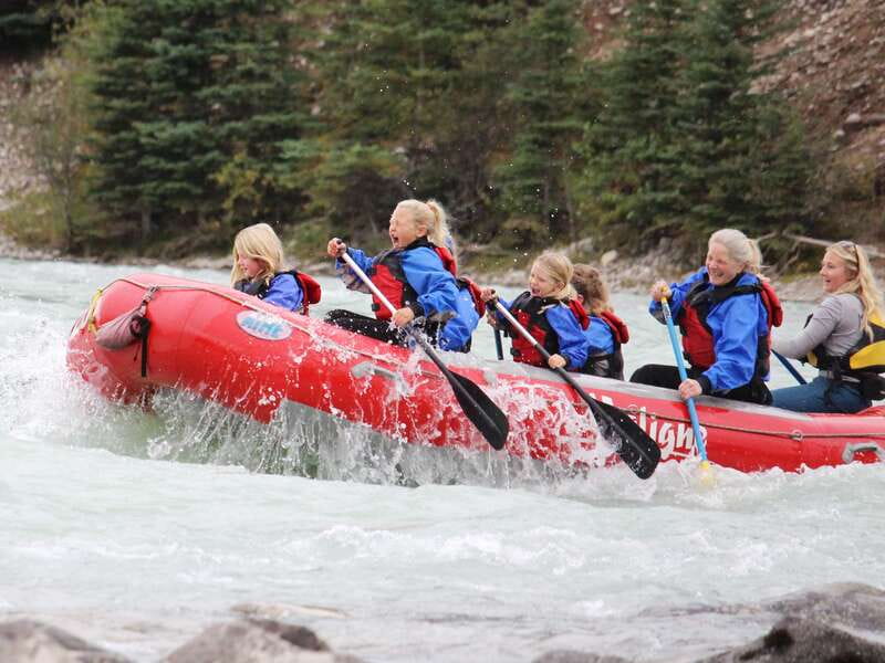Jasper National Park Family Friendly Rafting Adventure - Getting suited up beside glacial water