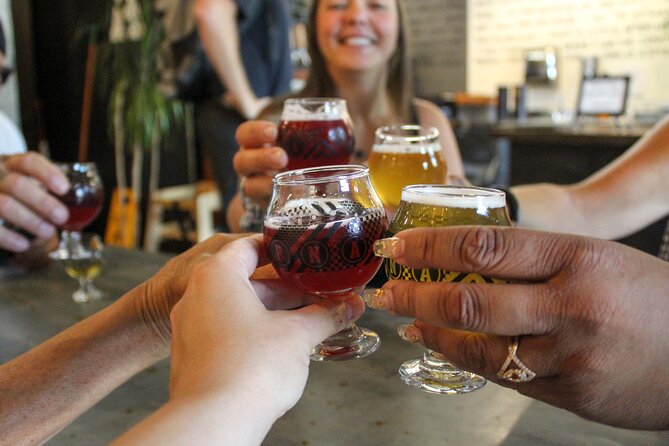 Kelowna: #1 Rated Walking Food Tour with 7 Tastings and 4 Drinks - Public art, waterfront parks, and local stories