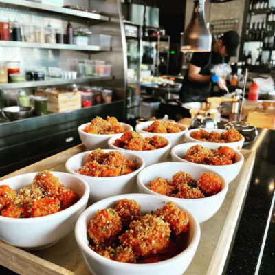 Walking Food Tour with 7 Tastings and 4 Drinks