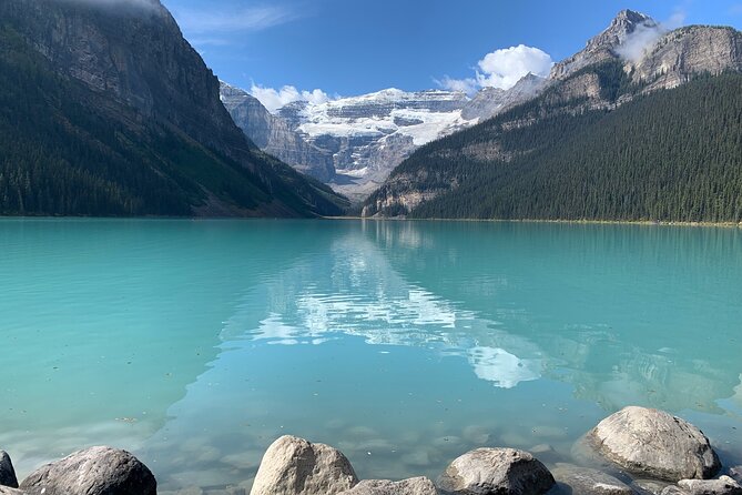 Lake Louise, Moraine Lake and the Icefields Parkway Full-Day Tour - Lake Minnewanka begins the morning with a story
