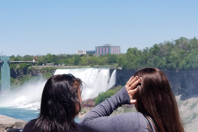 Mississauga: Niagara Falls Day Tour with Boat Cruise - The Floral Clock: a quick photo stop