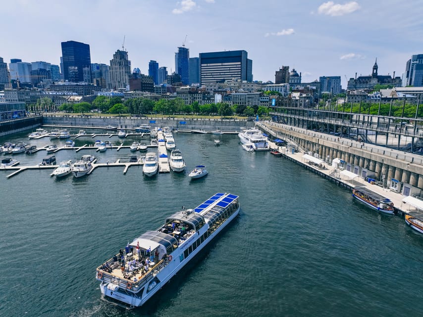 Montreal: Le Bateau-Mouche St. Lawrence Sightseeing Cruise - The Clock Tower and the Old Port from the water