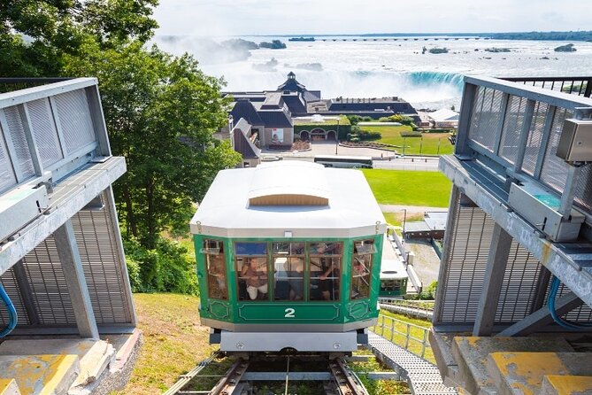 Niagara Falls Tour: Boat Cruise, Journey Behind Falls and Skylon - Journey Behind the Falls: tunnels, spray, and a close view