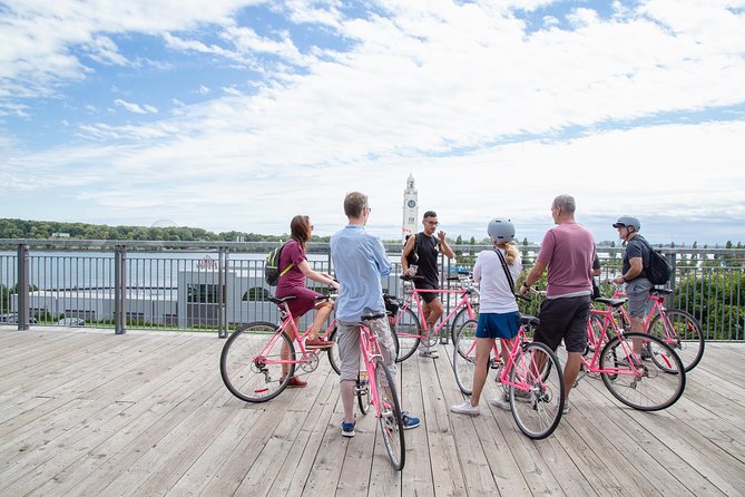 Non Touristy Pink Bike Tour by Spade & Palacio - The Leonard Cohen mural and Montreal’s street-art culture