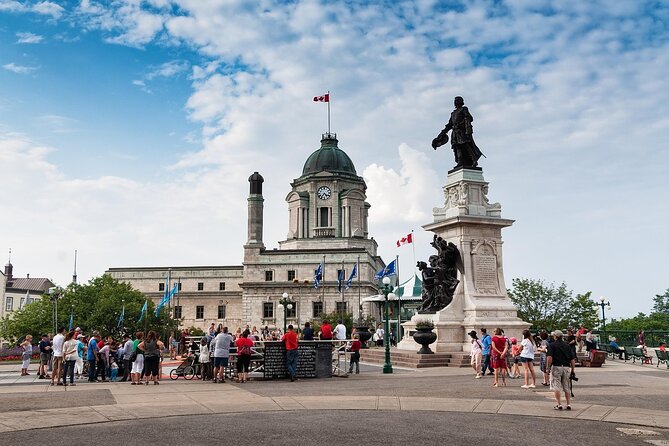 Old Quebec Walking Tour with a Certified Local Guide - Three city icons near Quebec City Hall
