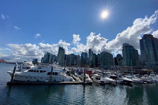 Private Guided Grand City Tour in Vancouver with your luggage - English Bay and Stanley Park bring Vancouver’s outdoor side into view