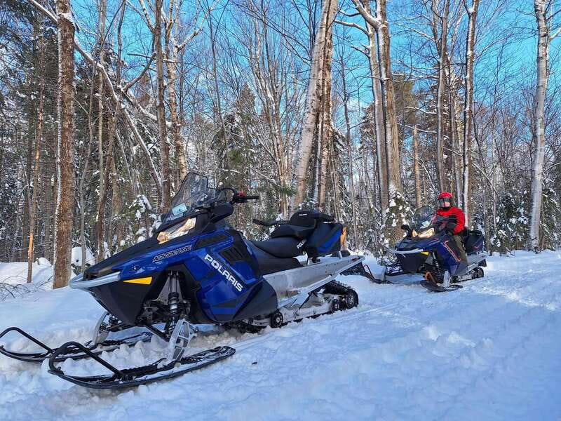 Quebec City: Guided Snowmobile Tour - Leaving Quebec City for the island’s snowy trails