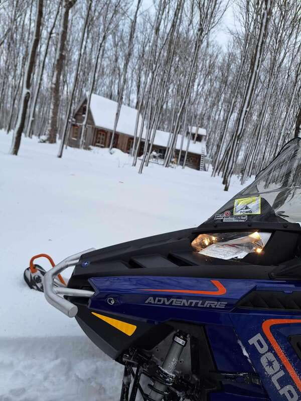 Quebec City: Guided Snowmobile Tour - Getting suited up for a Quebec winter