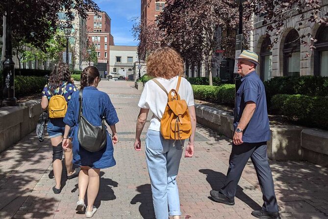 Semi-Private Old Montréal Walking Tour by Guidatour - Crossing Old Montréal toward Place d’Armes