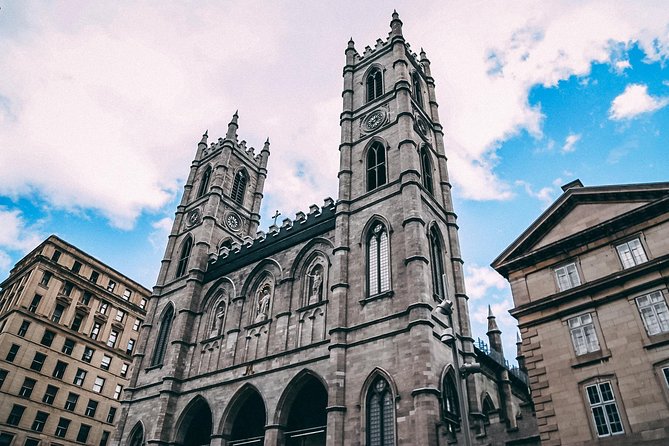 The Essential 101 Non-Touristy Walking Tour by Spade & Palacio - Notre-Dame Basilica and the grand opening scene