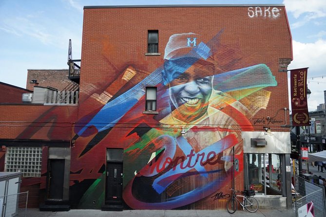 The Original Montreal Mural Arts Tour by Spade & Palacio - Saint-Laurent Boulevard, where the route opens up
