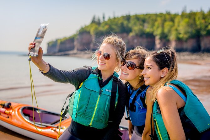 Three Sisters Sea Kayaking Day Tour - Paddling beneath Cape Chignecto’s colored cliffs